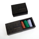 Three pairs of socks in green, terra-cotta and lilac in the 'Layers of Urban' box