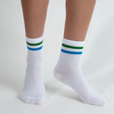 White crew socks with green-blue stripes