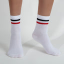 White crew socks with red-black stripes