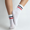 White crew socks with red-black stripes