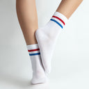 White crew socks with red-blue stripes